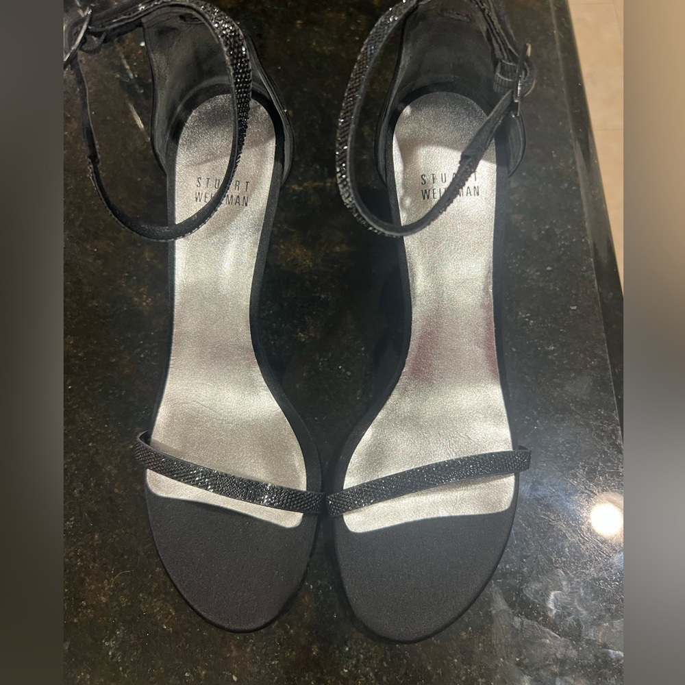 Never worn Stuart Weitzman Heels in size 7.5.